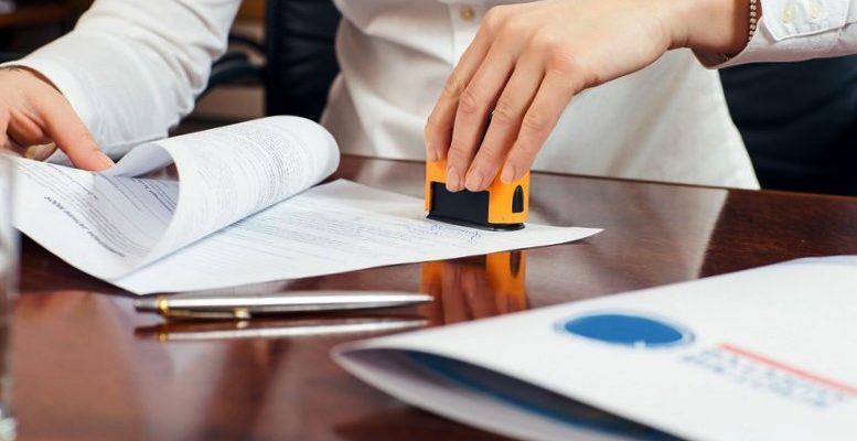 female hand with stamp female hand with stamp